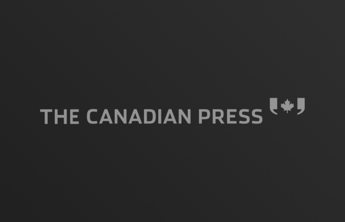 The Canadian Press logo on dark gradient background