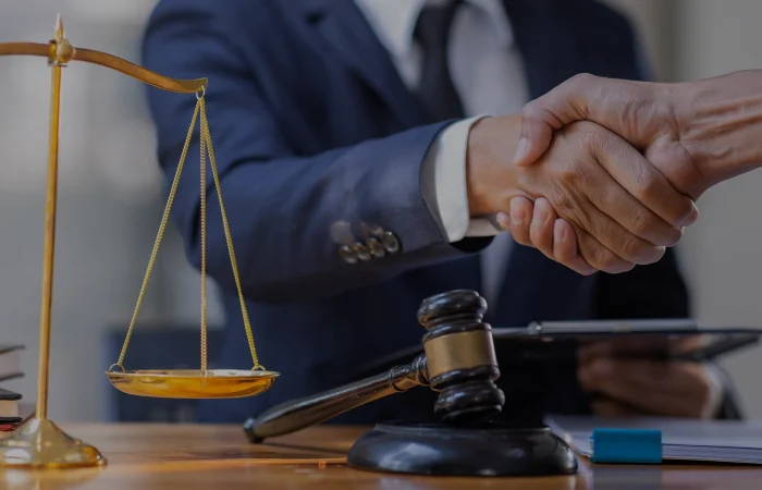 Businessman handshake to seal a deal Judges male lawyers justice and law concept. male lawyer working in office. Legal law, advice and justice concept