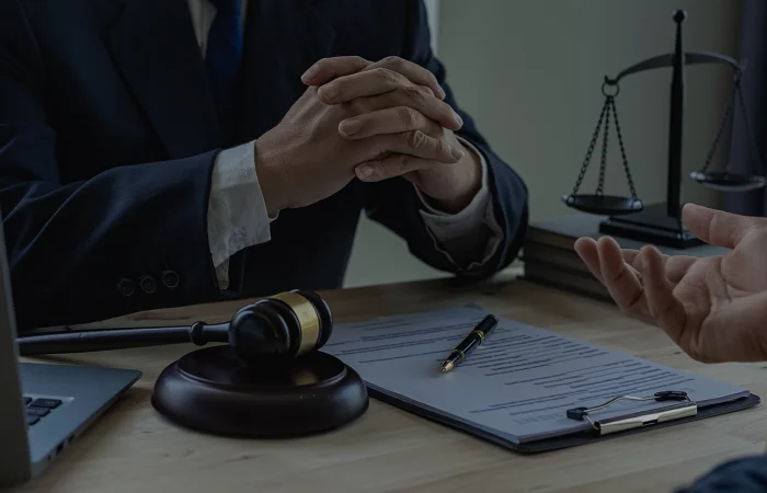 lawyer discusses and explains the business terms of contracts with clients in law firms