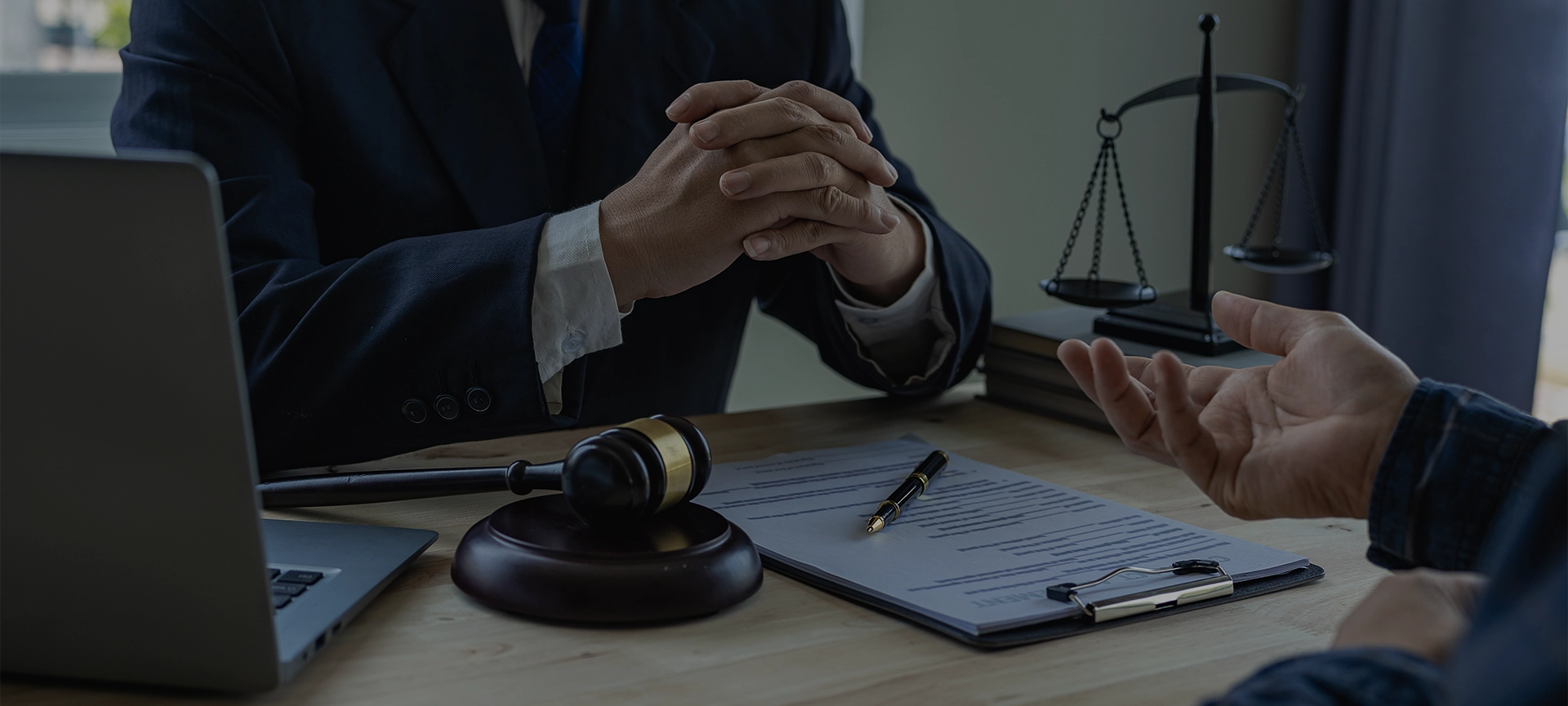 lawyer discusses and explains the business terms of contracts with clients in law firms
