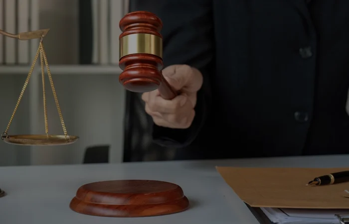 A lawyer passionately presenting a case in a courtroom emphasizing justice through legal action.