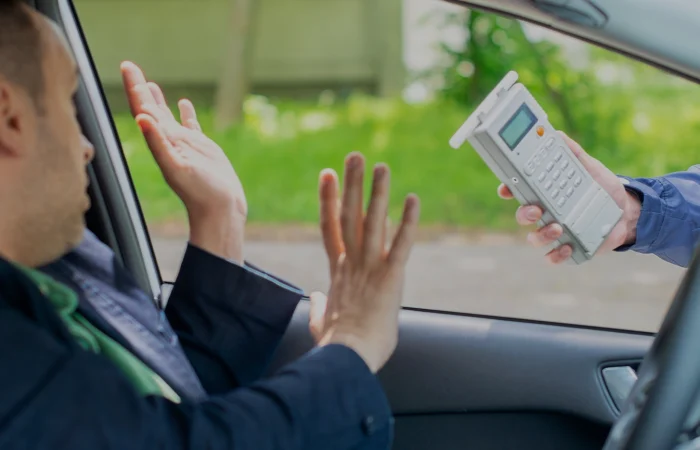 Driver due to being subject to test for alcohol content with use of breathalyzer