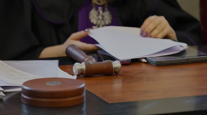 Judge's chain. The trial in Polish court, the insignia of law, lies on the bench.